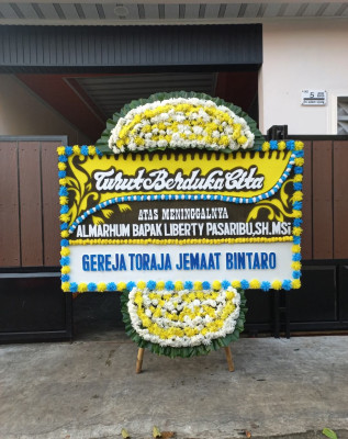 Papan Bunga Duka di Payo Lebar